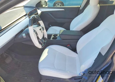 2022 Tesla Model Y из США, поврежденный, VIN 7SAYGDEE5NF562479